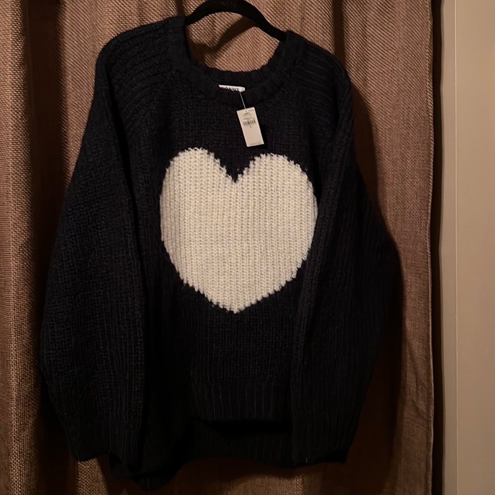 Brand new Navy Blue with white heart in XL. Runs wide. Paid $40 asking $35.